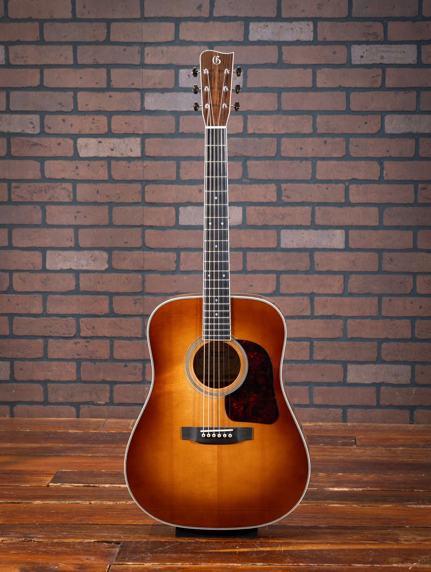 Gallagher Doc Watson Model acoustic guitar with dreadnought body, jumbo frets, vintage aesthetic, and glossy nitrocellulose lacquer.