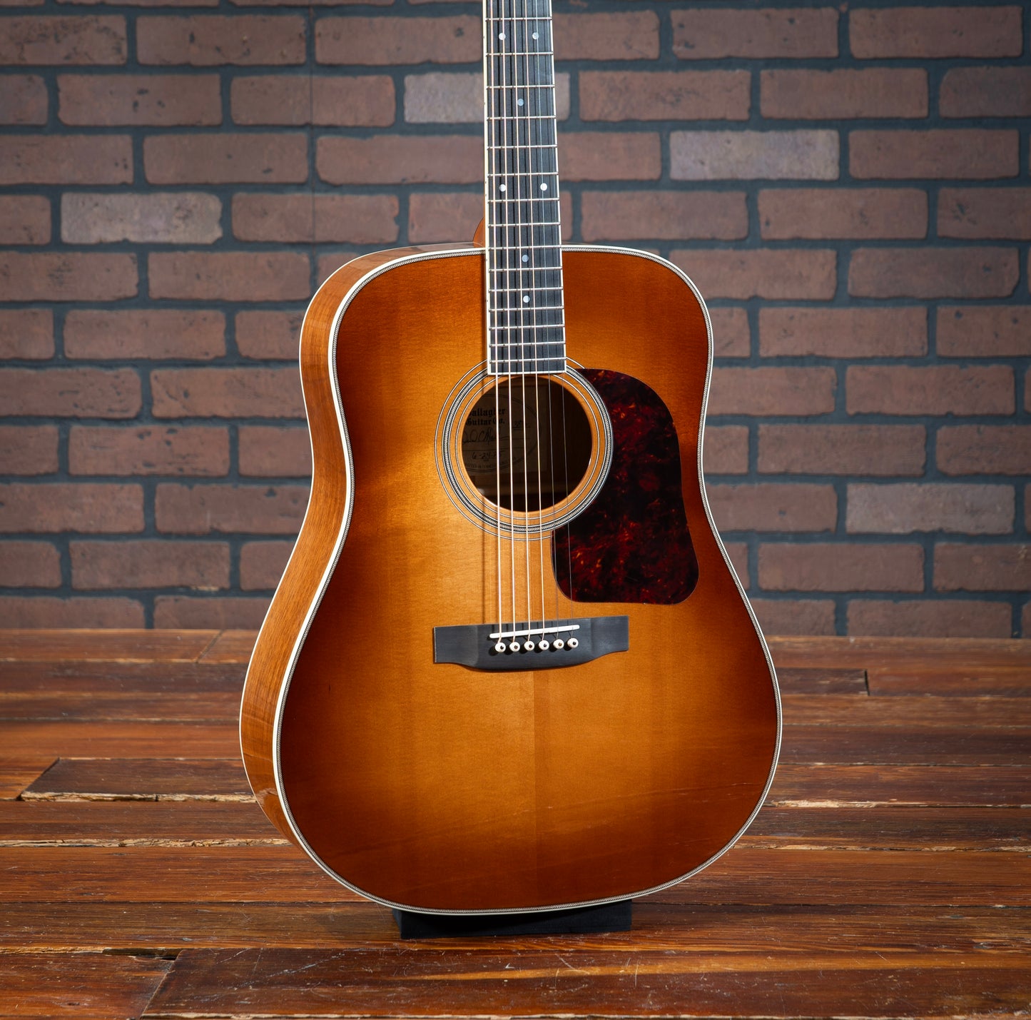 Gallagher Doc Watson Model acoustic guitar with custom sunburst, ivoroid binding, glossy nitrocellulose lacquer, and vintage aesthetic