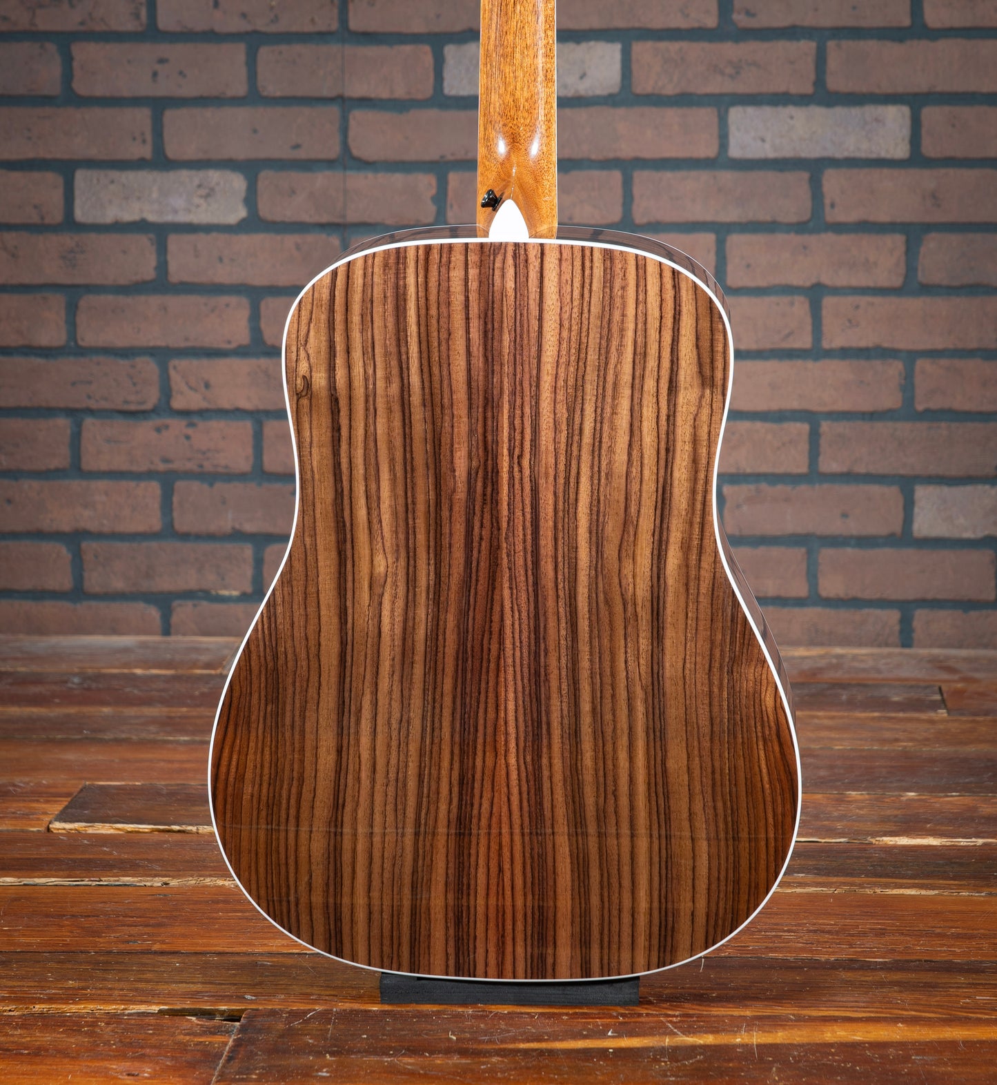 Taylor Legacy 810e acoustic electric guitar with Indian rosewood back, white binding, dreadnought body, and X-bracing